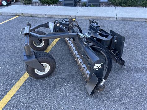 mini skid steer soil conditioner|bobcat rake attachment.